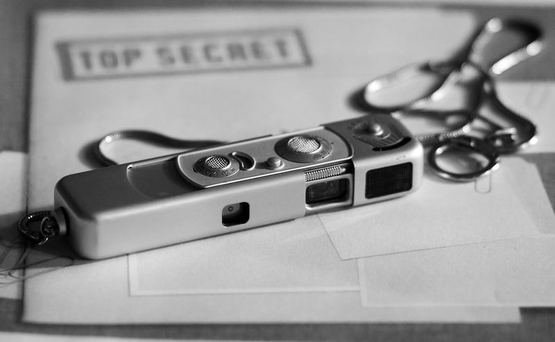 Spy with binoculars